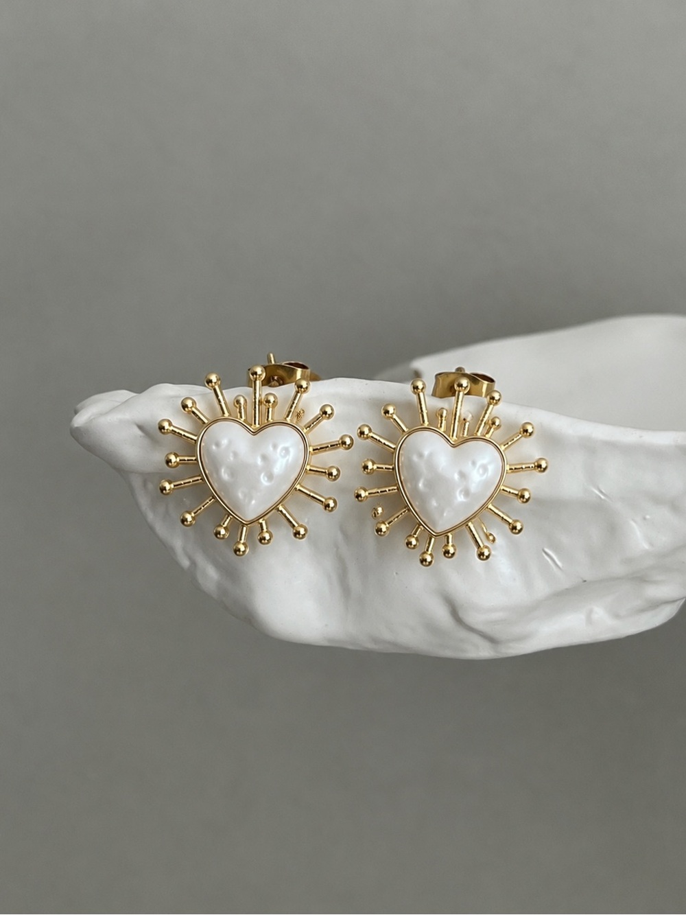 Gold Heart Sunburst Earrings with White Enamel Center